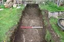 Thumbnail of W end of first leg, E extension. Scale 1m. Trowel points N.