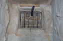 Thumbnail of Detail of blocked window in upper part of north wall of corridor, looking north