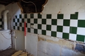 Thumbnail of The kitchen showing the lining to the south wall, looking southeast. 1m scale