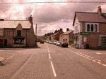 Thumbnail of Photograph of town crossroads, looking south