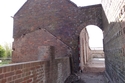 Thumbnail of Brick arch between barns 1 and 2, view SE