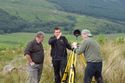 Thumbnail of Andrew White of the CGDT history and archaeology group, Stuart Jeffrey and Alastair Rawlinson of the Digital Design Studio, Glasgow School of Art, producing a laser-scan survey of the Lephinkill chambered cairn. <br/> (ColGlen_production_images_18.jpg)
