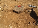 Thumbnail of Area 1, Cremation pit 1003/Urn RA2, looking north-east (0.3m scale)