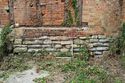 Thumbnail of Stone and brick plinth at S end of barn