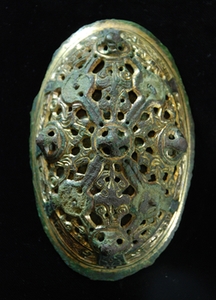 The original oval brooch which led to the discovery of the site.