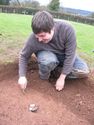 Thumbnail of Bitterley Excavation - Peter Reavill cleaning back