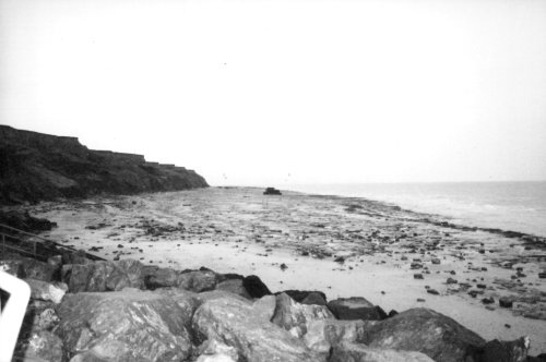 View from the beach of the eroded Naze headland