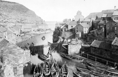 Fishing boats and nets at Staithes (© Whitby Museum)