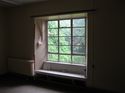 Thumbnail of Modern window replacement and window seating area