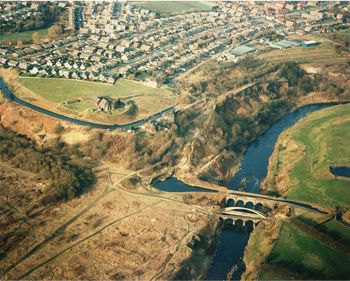 Disused aqueduct, canal basin and site of former locks at Nob End