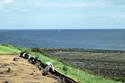 Thumbnail of Work shot on cliff edge of trench