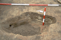 Thumbnail of Cist 2 during excavation (scales 2m and 50cm)