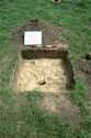 Thumbnail of Test Pit 21 after excavation (scale 50cm)
