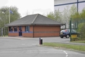 Thumbnail of Modern brick security office / gatehouse at the site entrance