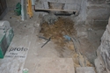 Thumbnail of Plate 17: Excavation in Floor of Crypt Bar Showing Medieval Wall Continuing Over Doorway