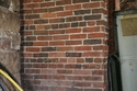 Thumbnail of C18 brick pier between threshing barn and bank barn