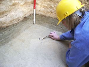 Excavation of a flint scatter in Test Pit 5