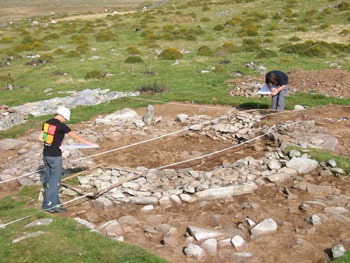 A small upland roundhouse being excavated at Hengwm, Dyffryn Ardudwy, Gwynedd