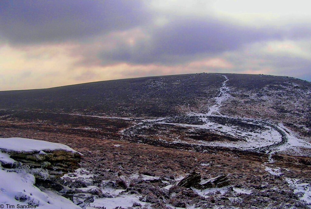 Frosty photo of the Bronze Age  settlement  called  Grimspound on Dartmoor. Competition winning image.