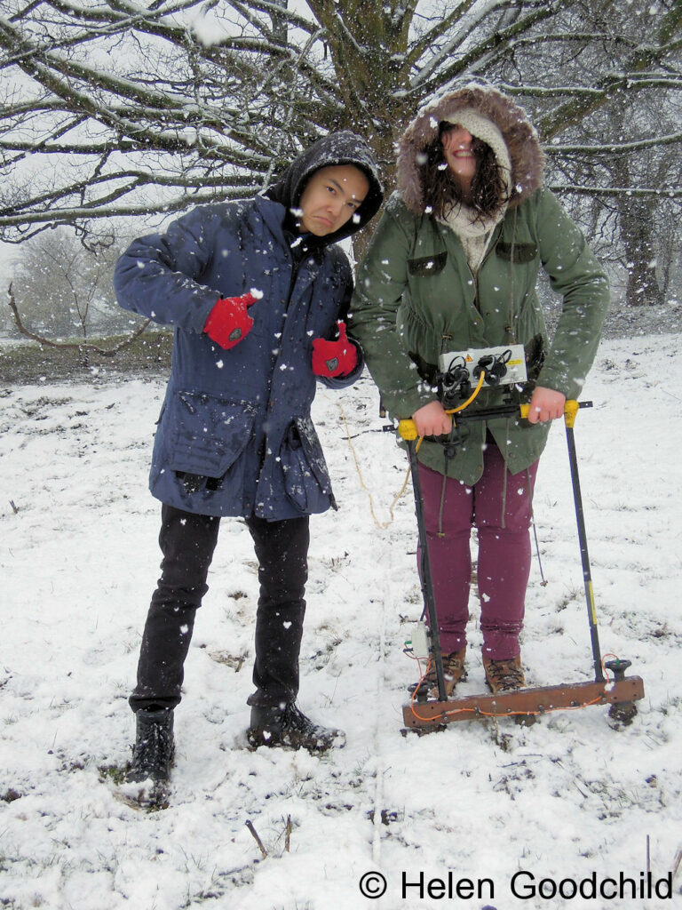 Two University of York students carrying out geophysical survey training in the snow. Competition winning image.