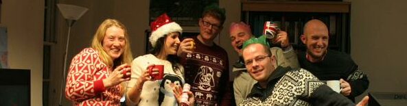 Another image of the dig team at a christmas party. Competition winning image.