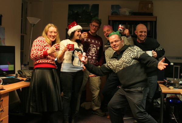 Another image of the dig team at a christmas party. Competition winning image.