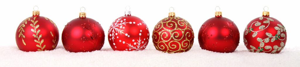 Image of a row of red Christmas baubles