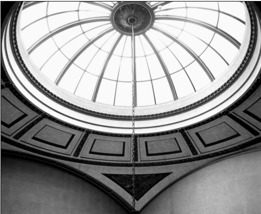 Black and white photo showing a detail of a domed glass ceiling at Chatsworth House