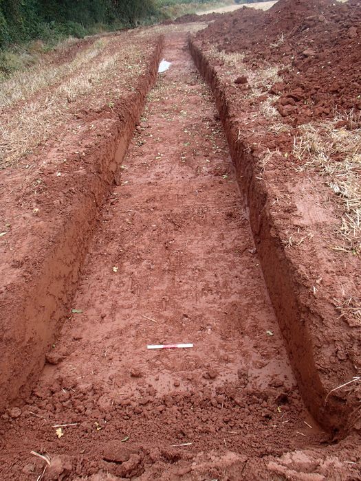 Trench with reddish soil