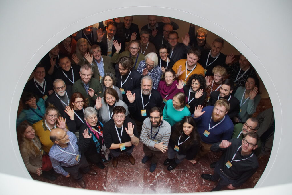 A photo from above of the ATRIUM team comprising 14 different organisations
