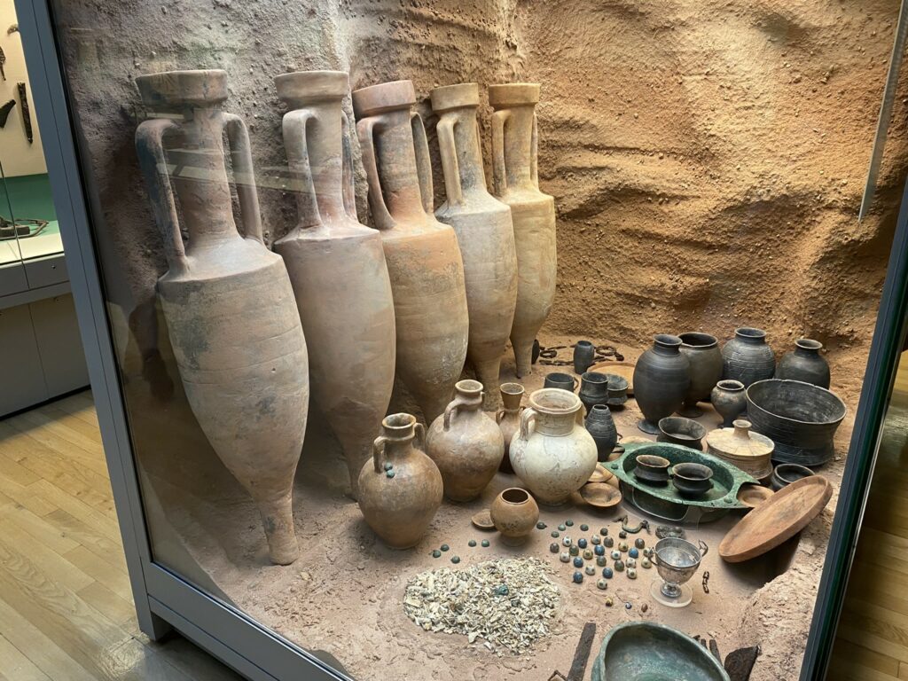 Reconstruction of Hertfordshire burial with Italian amphorae in British Museum (Room 50). Image credit: W. Givens