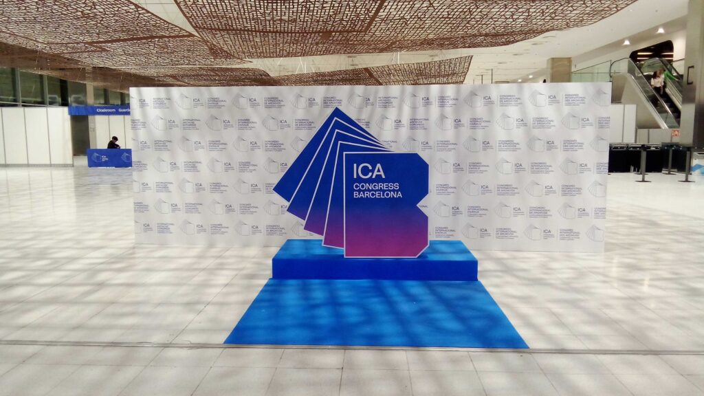 The entrance of the conference featuring a large ICA logo to stand beside