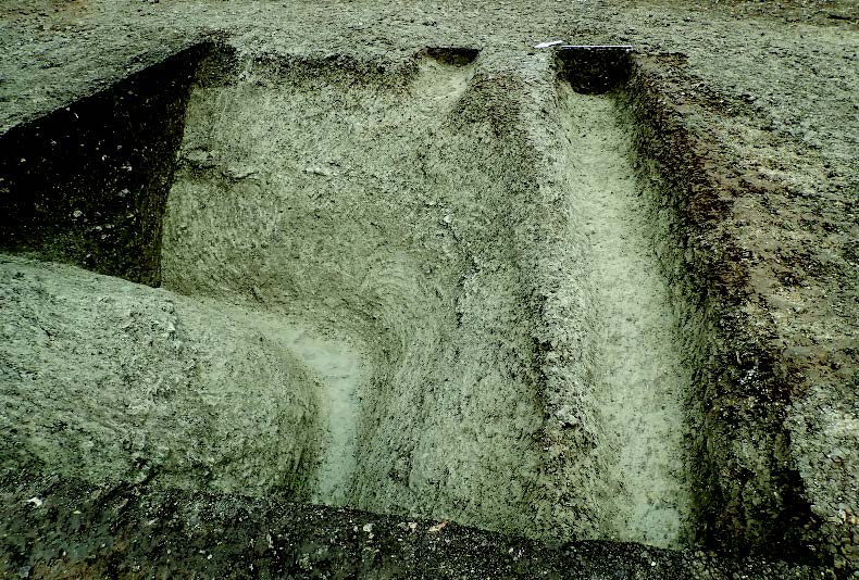 Enclosure ditch cut by two smaller ditches, all Middle Iron Age. Copyright HS2 Ltd.