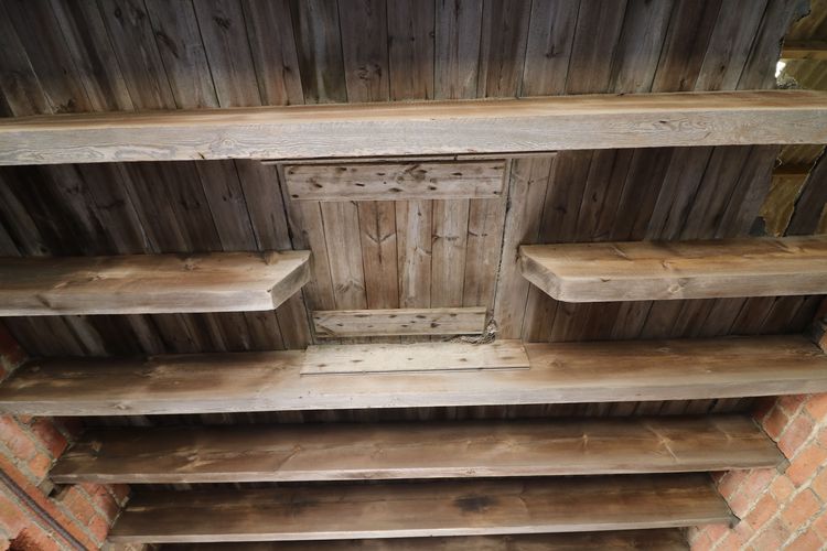 Thumbnail of Figure 10 Ceiling of coach-style arch with hatch looking north