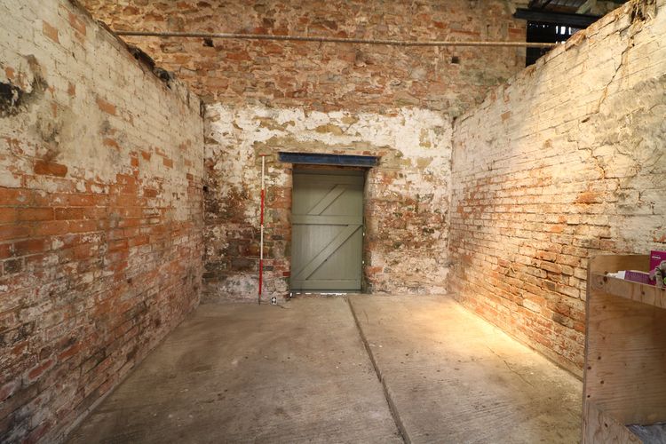 Thumbnail of Figure 18 and 59 Interior of stable Room B3 looking north