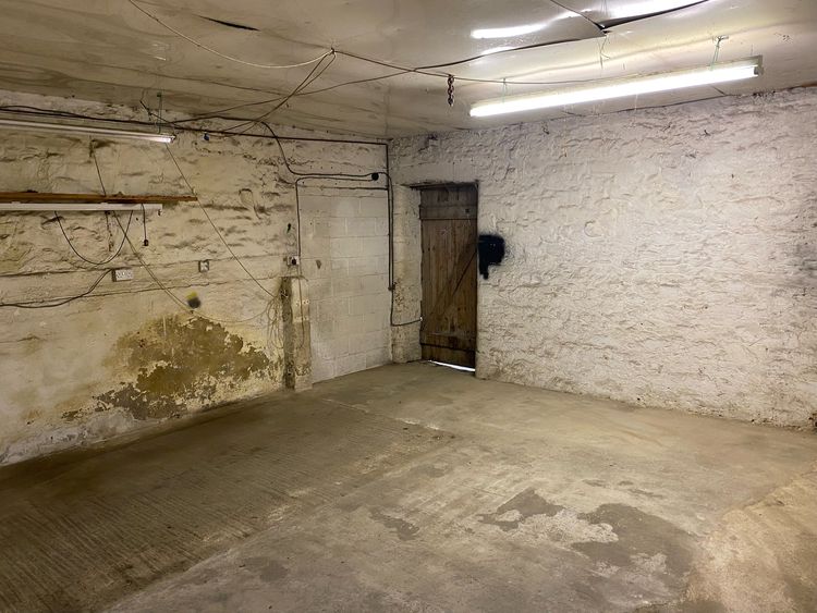 Thumbnail of Figure 22 Blocked doorway and original opening to Room B5 looking northwest