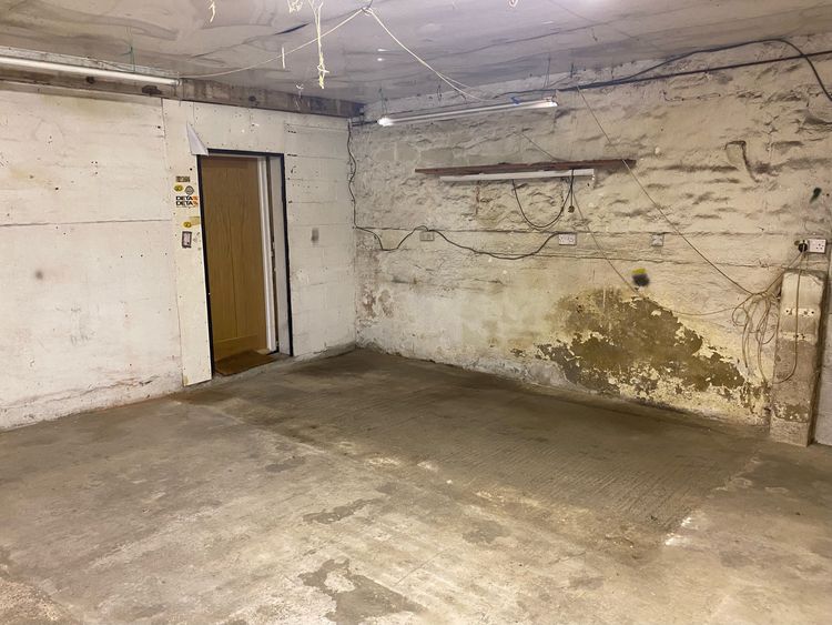Thumbnail of Figure 23 Modern doorway and blockwork connecting Room B5 to Range C looking southeast