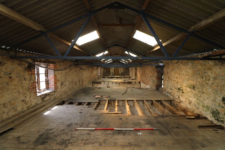 Thumbnail of Figure 27 and 77 View west of the first floor of Range B