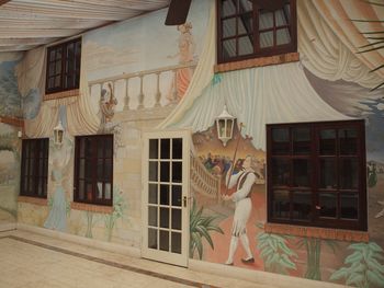 Shot of the 1986 Timothy Plant mural 'The Sad Tale of Pierrot' from the right side