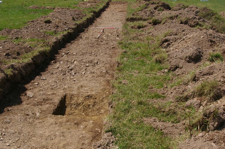 Thumbnail of A shot of Ditch [1303] and Ditch [1305] and Ditch [1307]; looking south-west (1m and 2m scales).