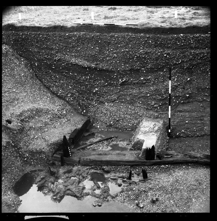 Thumbnail of 27-5 View looking N of Beam A and N section of Great Ditch I with scale
