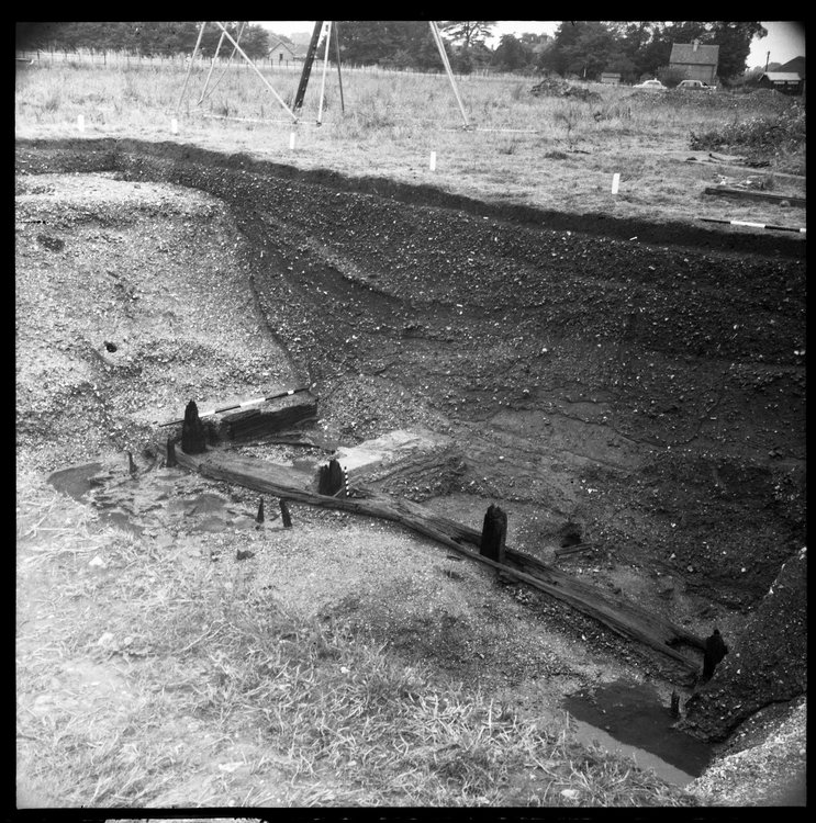 Thumbnail of 30-4 View looking N of Beam A and N section in Great Ditch I with scale