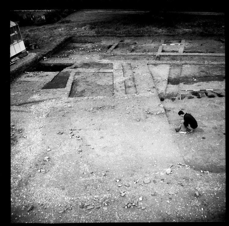 Thumbnail of 33-6 View looking E of IDX during excavation with archaeologist and scales