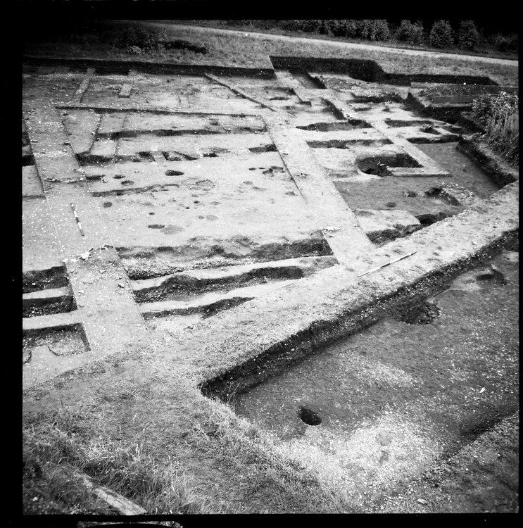 Thumbnail of 46-1 View looking NE of IDX fully excavated with archaeologists and scale