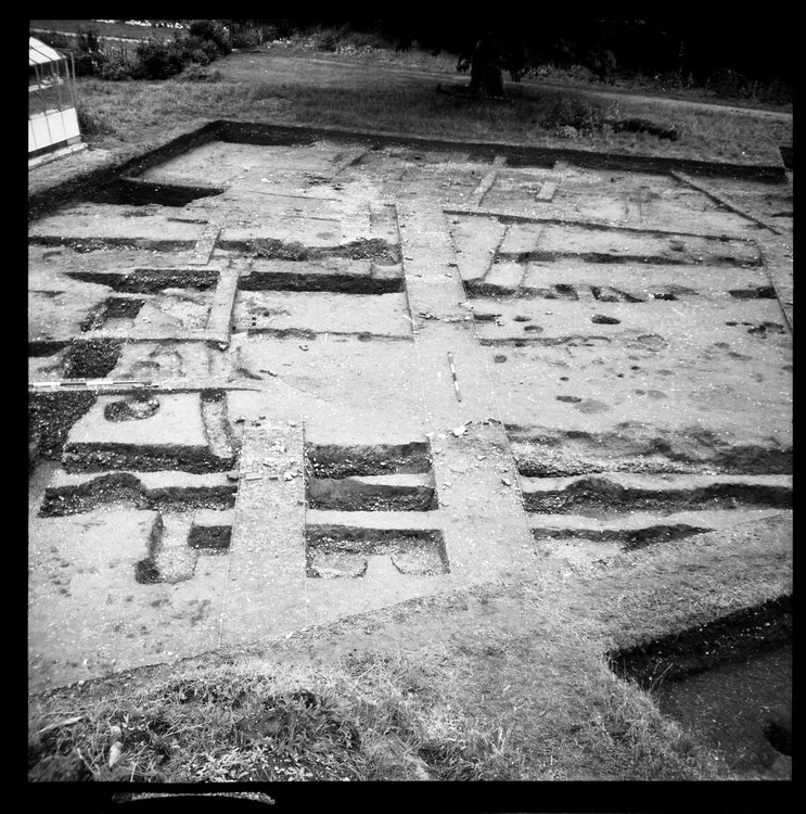 Thumbnail of 46-3 View looking NE of IDX fully excavated with archaeologists and scale
