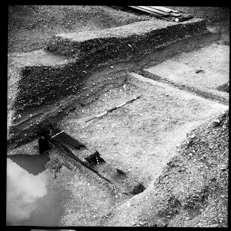 Thumbnail of 48-5 View looking NW of Beam B in Great Ditch II middle section with scale
