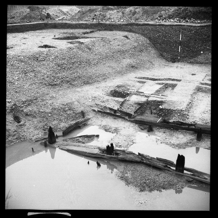 Thumbnail of 49-10 View looking NW of Beams A B and C in Great Ditch II middle section fully excavated with scale