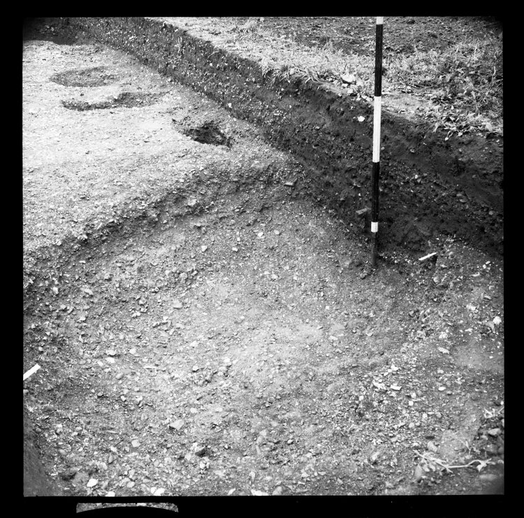 Thumbnail of 5-5 Close up of W section of foundation trench in PC III with scale