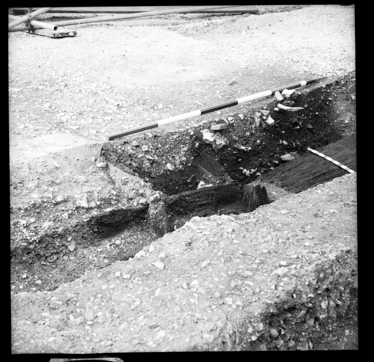 Thumbnail of 56-1 Close up looking NE of W side of Beam B during excavation in Great Ditch II with scale