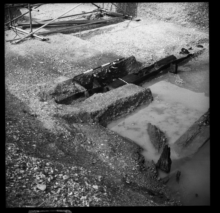 Thumbnail of 56-5 View looking NE of Beams A and B during excavation in Great Ditch II with scale